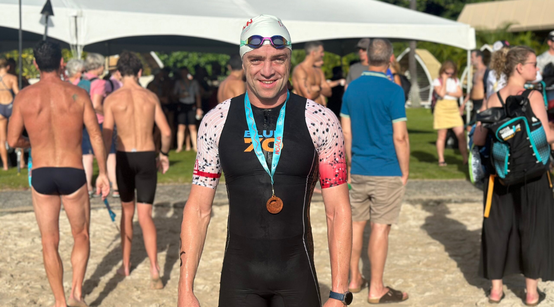 Coach Ross wearing Blue70 SwimSkin
